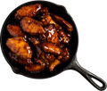 Maple Bourbon Wings plated with a sweet smoky glaze
