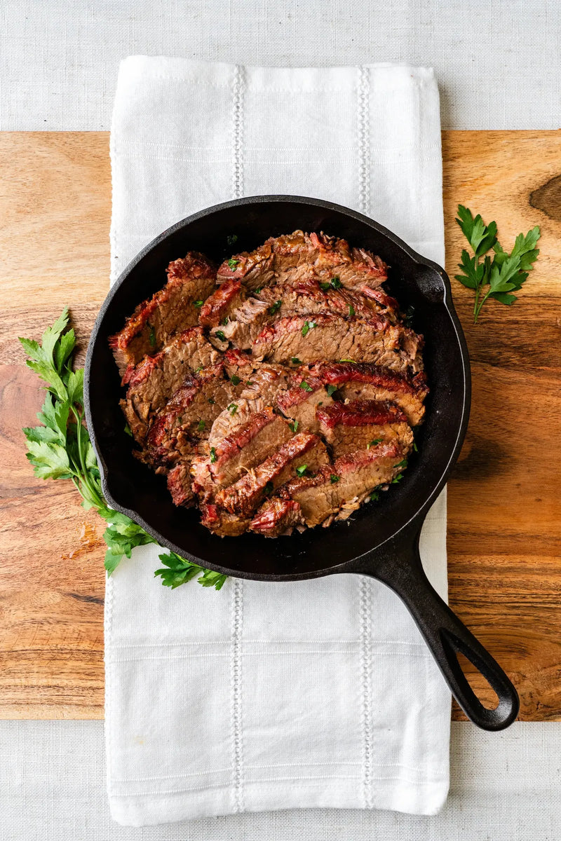 Texas Smoked Brisket in a cast-iron skillet