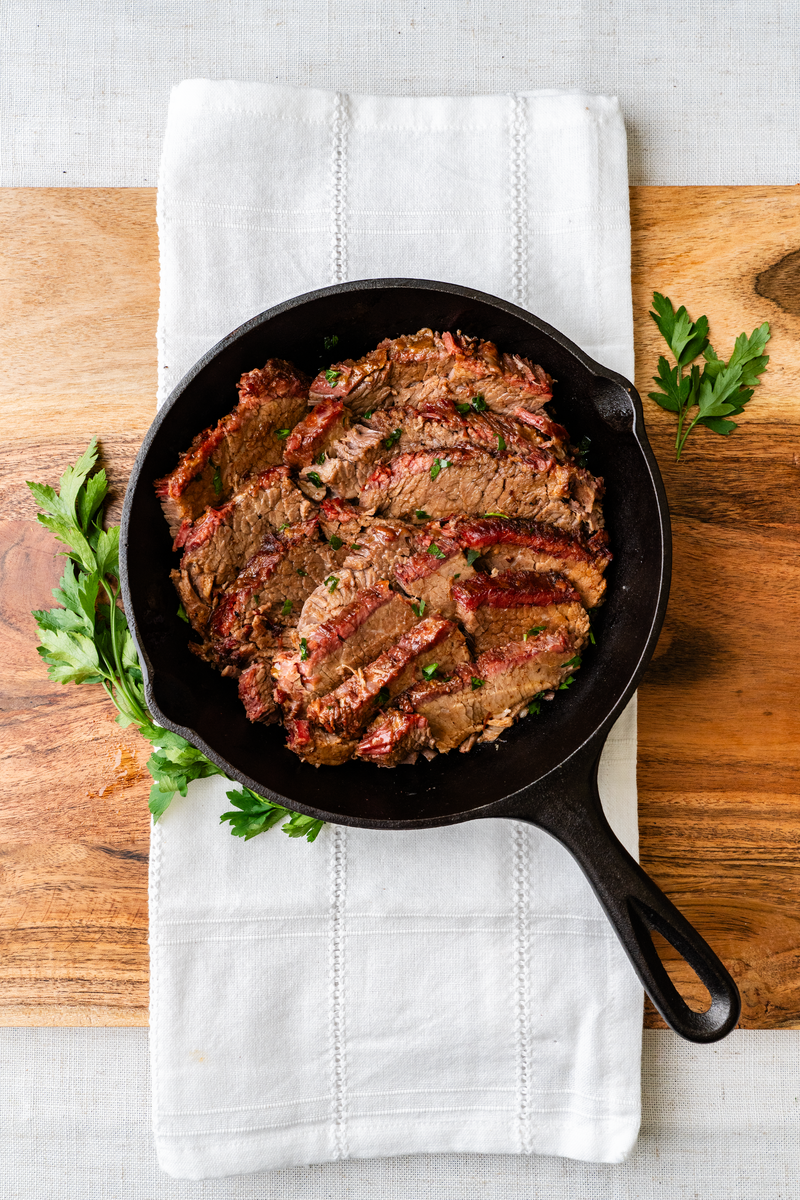 Texas Smoked Brisket in a cast-iron skillet