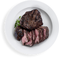 Cooked Classic Sirloin steak on a white plate