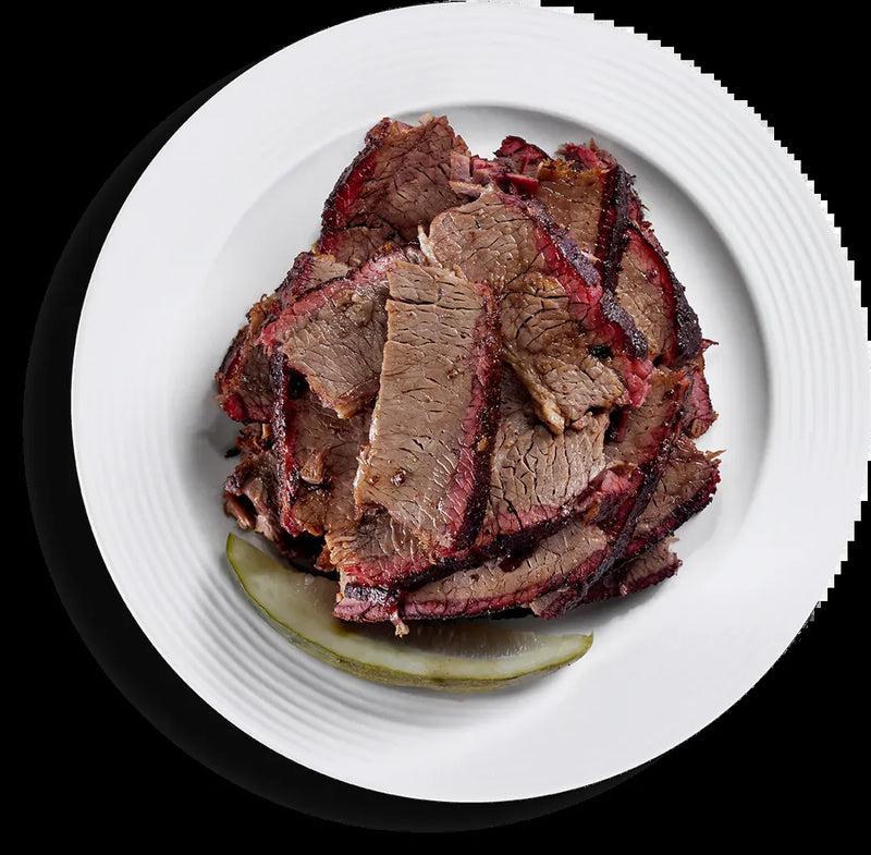Cooked Texas Smoked Brisket on a white plate
