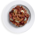 Cooked Tennessee Pulled Pork on a white plate
