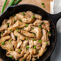 Cooked Japanese Teriyaki Chicken served in a cast-iron skillet