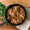 Cooked Tennessee Pulled Pork served in a cast-iron skillet