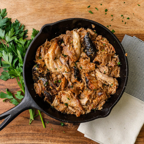 Cooked Tennessee Pulled Pork served in a cast-iron skillet