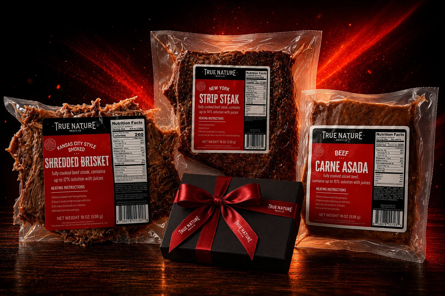 True Nature Meats New York Strip Steak, KC Shredded Brisket, and Beef Carne Asada packages with a digital gift card