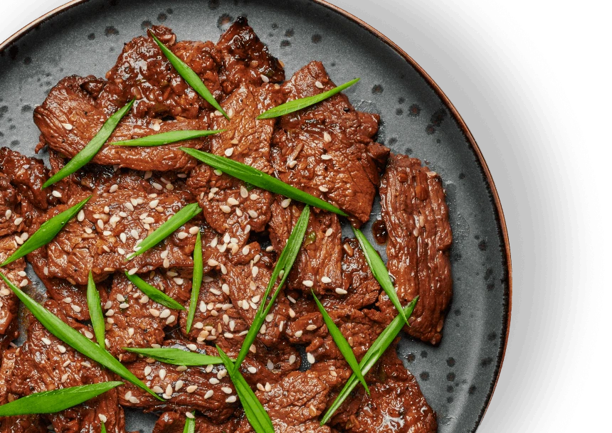 Premium cooked meat with green onions and sesame